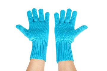 Obraz premium Warm winter children's gloves in hand isolated on white background. Sale and buy
