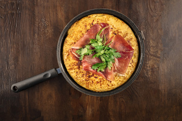 Overhead photo of Spanish tortilla with copy space