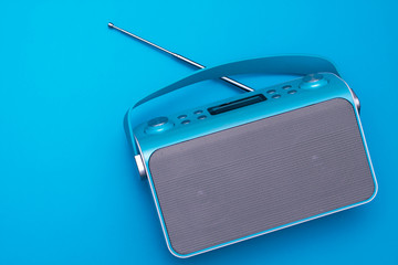 Top view on new digital blue radio,which it is stylized art retro style radio.