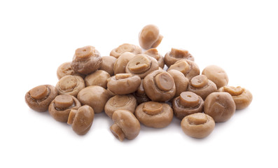 Fresh champignon mushrooms isolated on white.