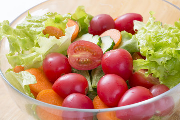 Fresh mixed vegetables salad on table.
