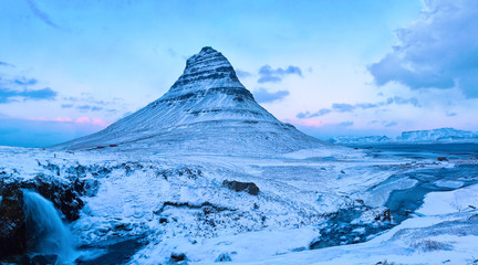 The Kirkjufell mountain in winter at twilight, Snaefellsnes, Iceland.
