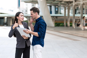 Sale woman trying to sell insurance to potential male client.