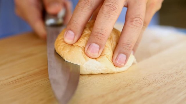 cutting  bread  on board