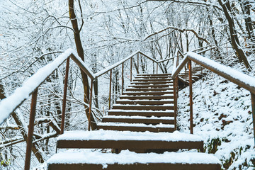 The stairs are covered in snow