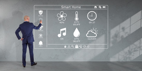 Businessman using smarthome interface on a wall 3D rendering