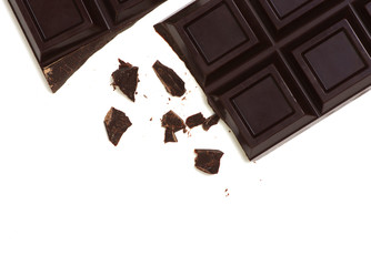 Broken chocolate bar isolated on white