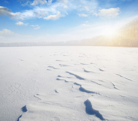  Snowcovered fields on blue sky
