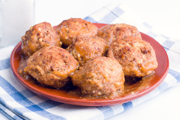 Stewed meatballs in sauce