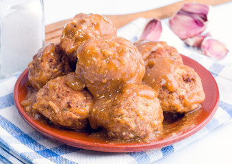 Stewed meatballs in sauce