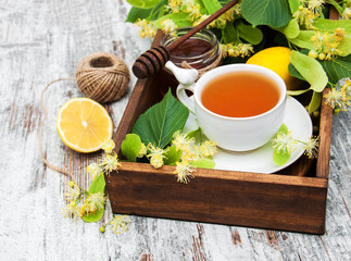 cup of herbal tea with linden flowers