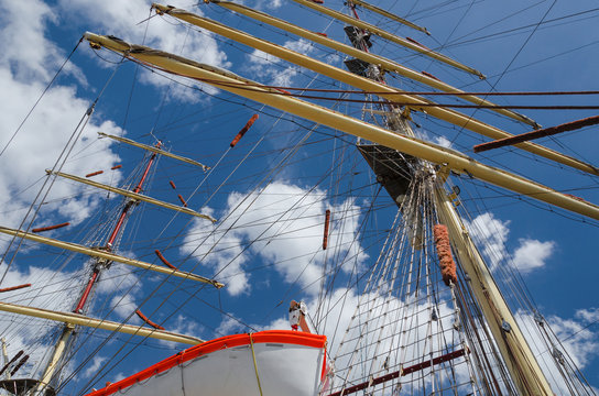 SAILING SHIP - Masts of a sailing ship against the sky
