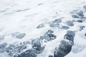 Footprints in ice-crushed ground