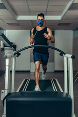 Fototapeta na wymiar Sports man monitoring his fitness performance