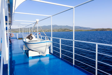 Wooden lifeboat on davits mechanism, rowboat