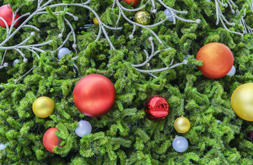 Christmas concept : Decorated artificial Christmas tree and Christmas balls
