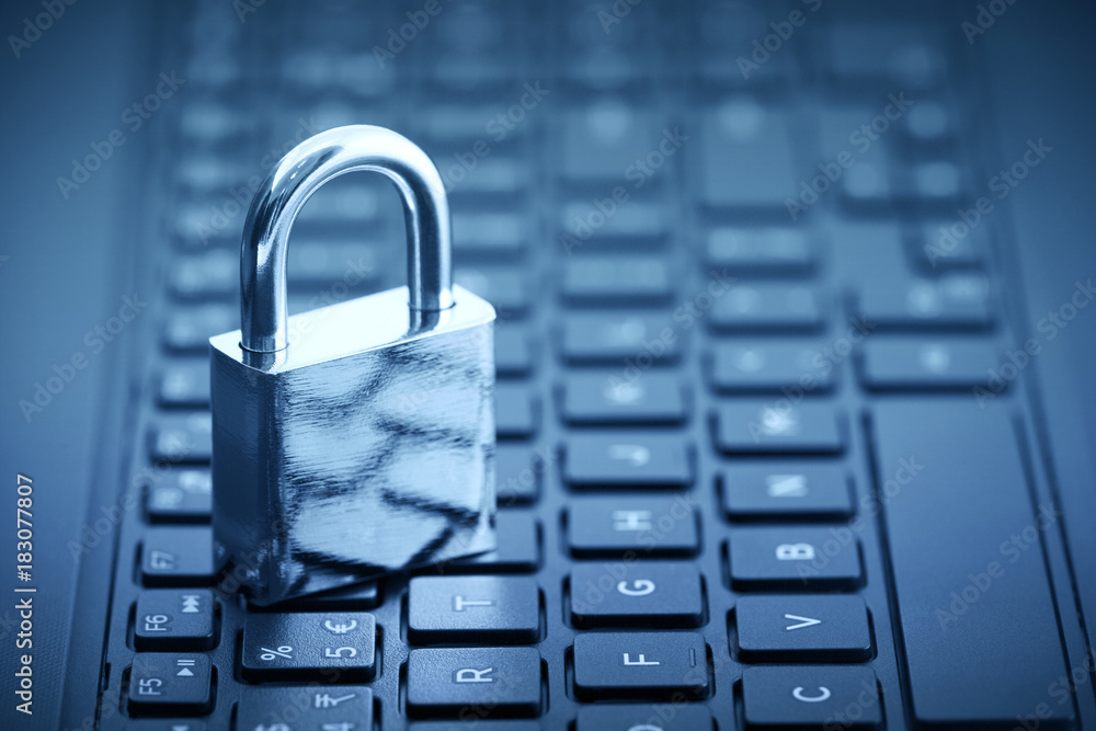 Poster computer security concept. padlock on computer keyboard
