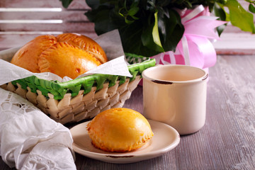 Homemade mini pies with sweet filling and coffee
