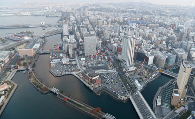 Fototapeta na wymiar 日本・横浜の都市風景「横浜の街並みを望む」【画面右は、横浜市市庁舎移転新築工事現場】