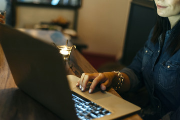 woman's hands using computer