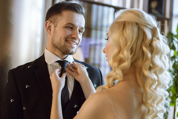 happy young couple at the wedding love each other, tender photo of the bride and groom