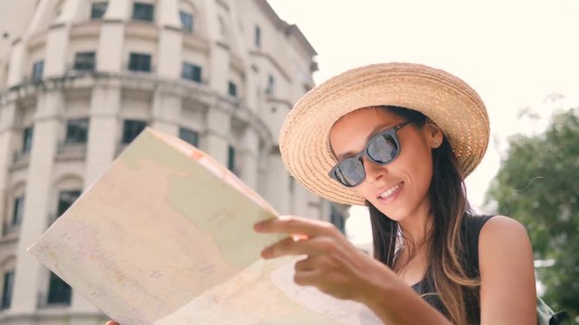 Attractive Young Tourist Woman Exploring City and Holding Map in Thailand. 4K, Slow Motion.