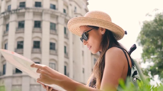 Attractive Young Tourist Girl Check Directions on City Map and Walking at Old Street. 4K, Slow Motion.