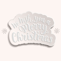 Naklejka na ściany i meble We wish you a Merry Christmas lettering: embossed sticker with shadow on puffy background vector