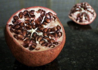 Pomegranate cut with seeds