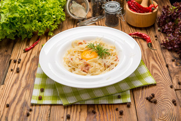 Spaghetti alla carbonara. beautiful and tasty food on a plate