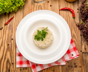 Vegetarian fried rice with tomatoes and green onion. beautiful  tasty food on a plate