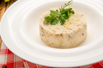 Vegetarian fried rice with tomatoes and green onion. beautiful  tasty food on a plate