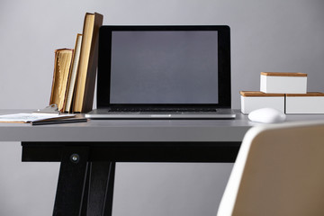Workspace with computer and documents in office