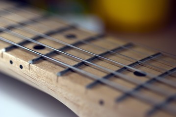 Guitar strings and fretboard.