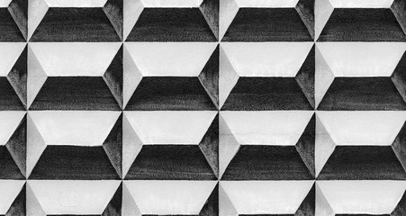 Abstract geometric pattern on a concrete wall, black and white