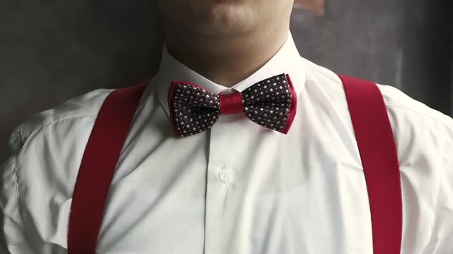 young Asian man wearing a bow tie
