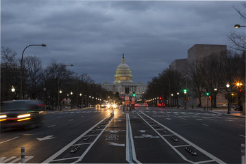 US Capitol Building with Pennsylvania Ave at dusk