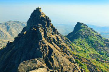 Hindu temple of Lord Dattatreya on top of Guru Dattatreya peak. Girnar Hill, Junagadh, Gujarat, India 