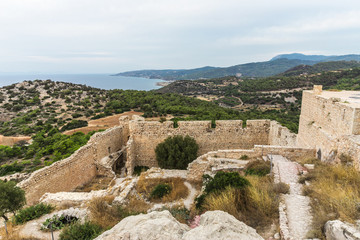 Fototapeta na wymiar The Castle of Kritinia in Rhodes, Greece. It is today ruined but offers great views to the Aegean Sea, the island of Halki and the port of Kameiros 