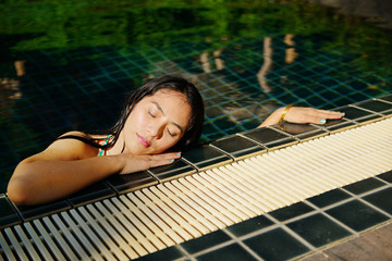 Woman enjoy relaxing in the pool