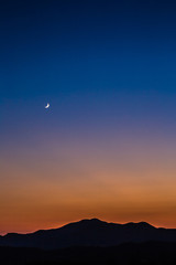 The evening, the hills, the moon, the sunset