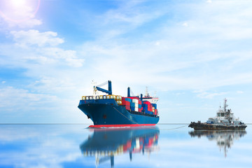 ship with container on soft sky background.