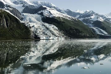 Scenic landscape with glaciers flowing into the water at College Fjords, Prince William Sound, Alaska