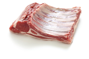 rack of Lozere lamb, raw meat isolated on white background