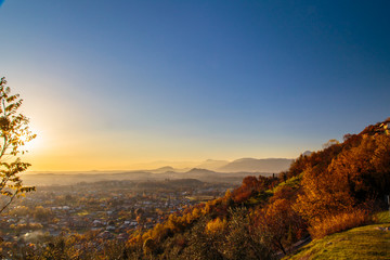 Naklejka premium colorful autumn sunset in the italian countryside