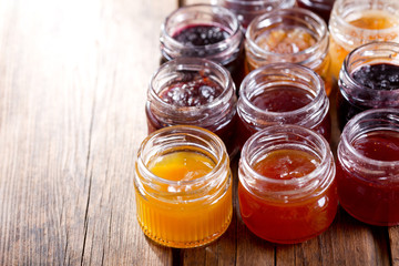 various jars of fruit jam