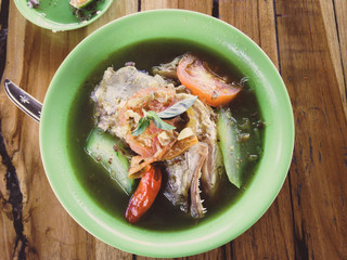 Fish head soup in Indonesia.