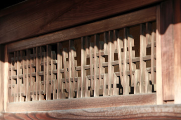 Wooden louver of Japanese house on sunlight. Japanese traditional wooden ventilation channel of home on sunshine. It is to allow air or light to pass through.
