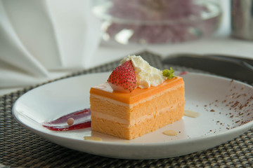  Orange Sponge Cake on a white plate