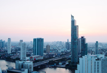 Fototapeta na wymiar Bangkok view with soft beautiful sunset light . megapolis, buildings, asia, river. summer